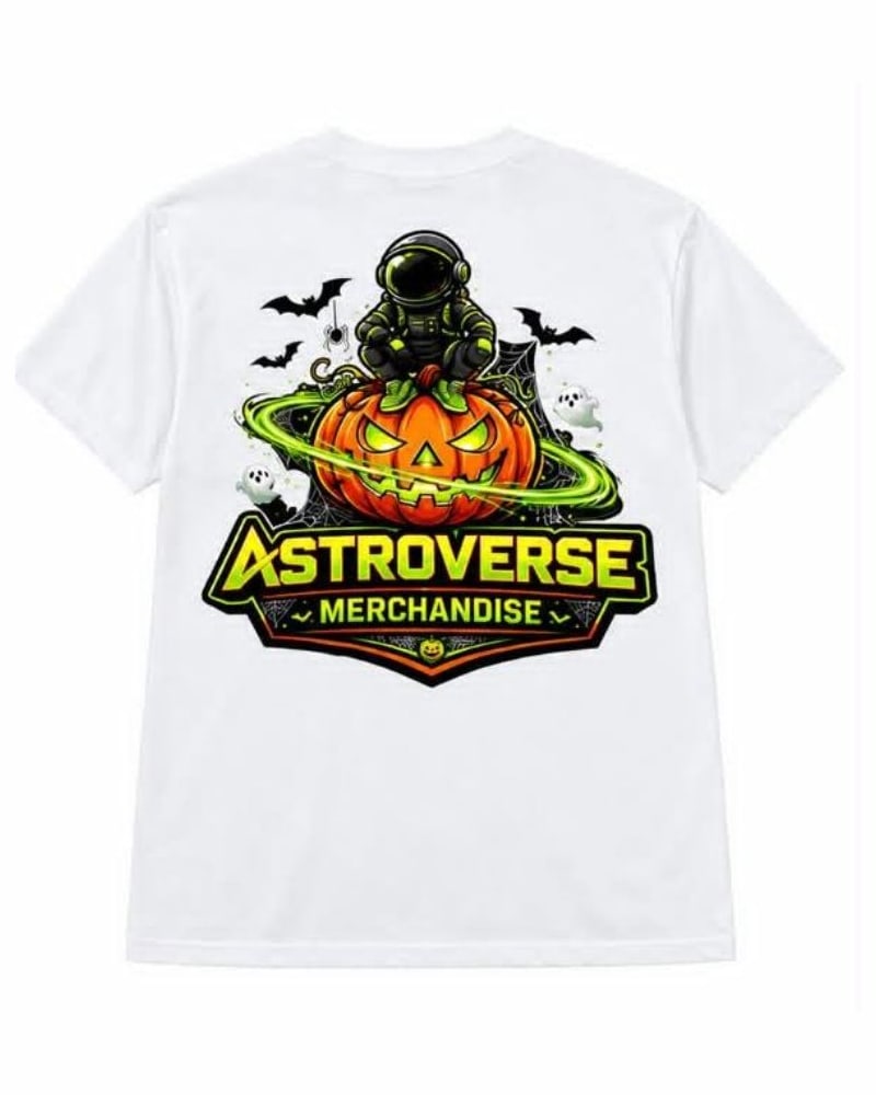 Back of the white Green Orbit Halloween tee: an astronaut sitting on a carved pumpkin with a lime orbit, bats, ghosts and green and yellow ASTROVERSE MERCHANDISE lettering.